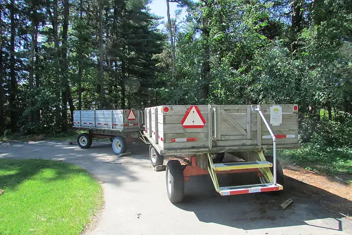 Farm wagons and trailers lined up for hayrides